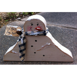 Primitive Wood Snowman 1672SNB Melting Snowman homespun scarf, rusty bell, and 'I'd melt for you' tag. Primitive Wood Snowman 1672SNB Melting Snowman homespun scarf, rusty bell, and 'I'd melt for you' tag.