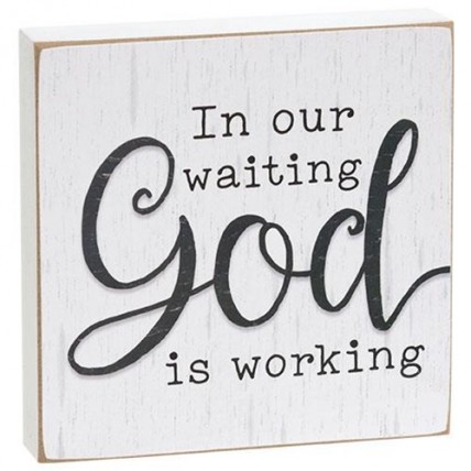 In our waiting God is working wood block In our waiting God is working wood block
